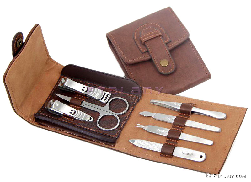 Folding manicure set with button